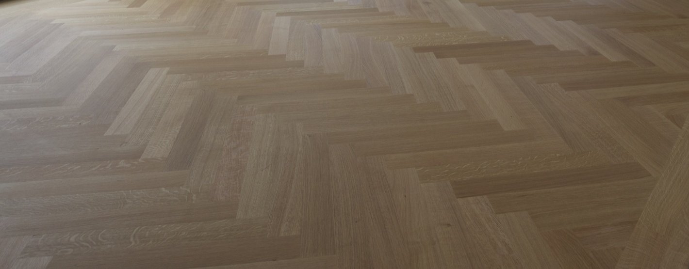 White oak herringbone floor installed by Arpa Flooring Design at 80 Clarkson, Manhattan's West Village